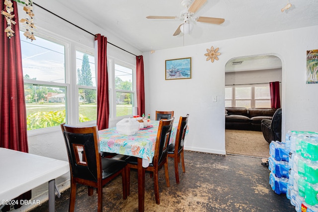 dining space featuring ceiling fan