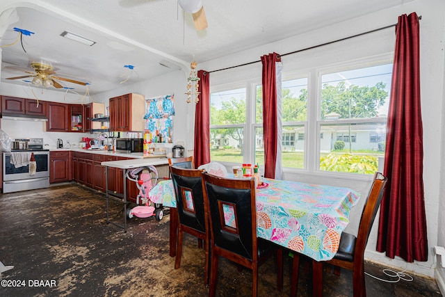 dining space featuring ceiling fan