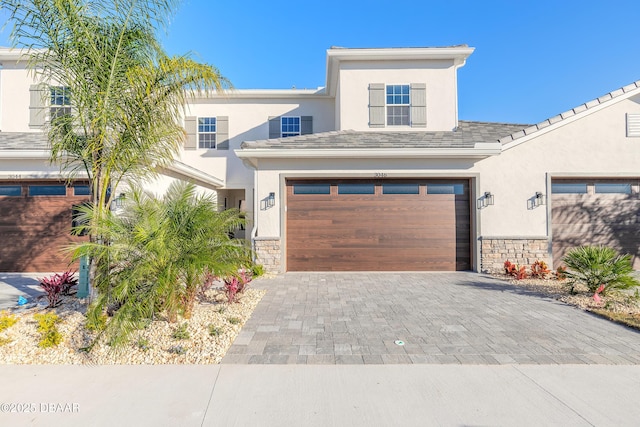 view of front of property with a garage