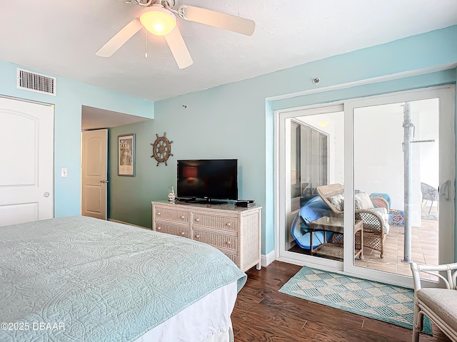 bedroom featuring dark hardwood / wood-style flooring and ceiling fan