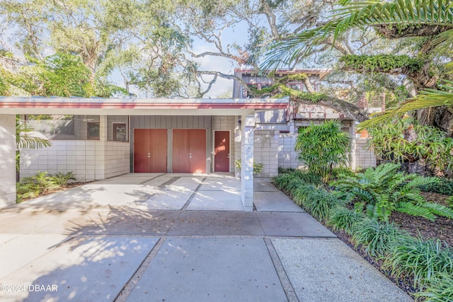 garage with a carport