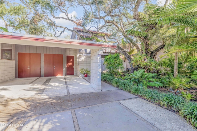 garage with a carport