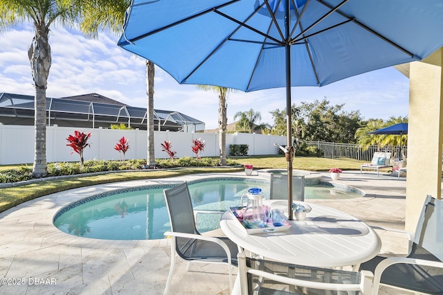 view of swimming pool featuring a patio area