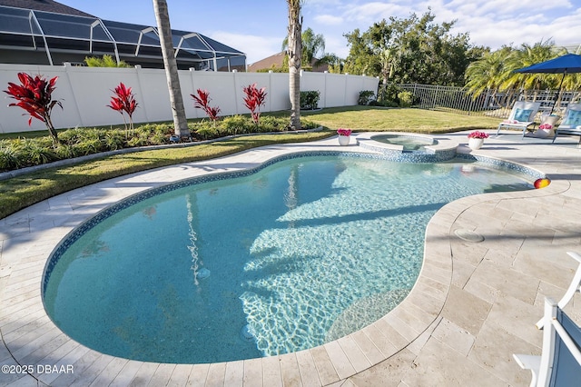 view of swimming pool featuring an in ground hot tub and a patio