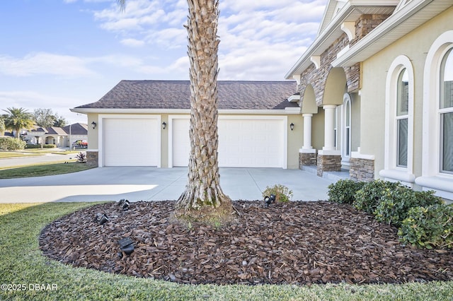 view of property exterior with a garage