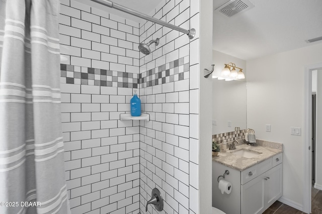 bathroom with vanity and a shower with curtain