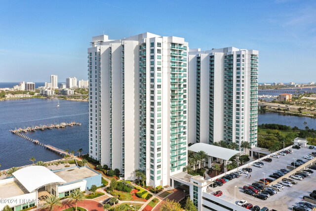 view of building exterior featuring a water view