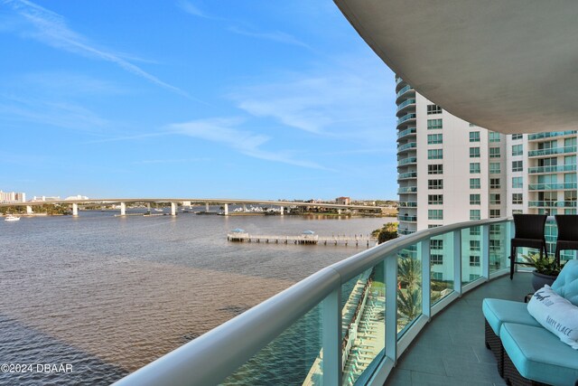 balcony featuring a water view