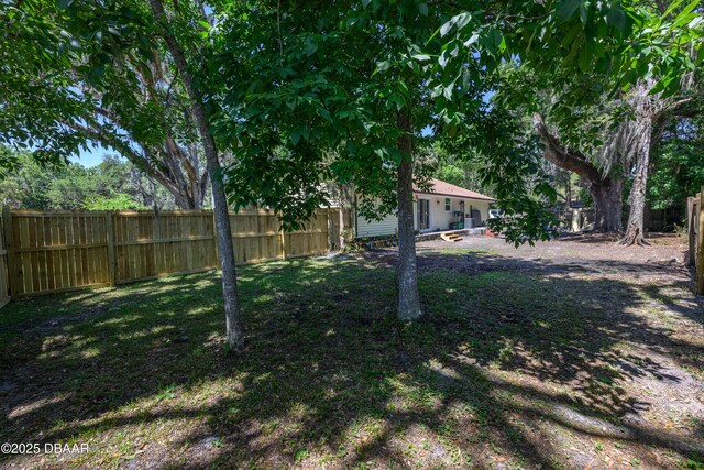 1635 Magnolia Ave, South Daytona, FL 32119 - view of yard featuring a fenced backyard