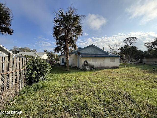 view of yard with a fenced backyard