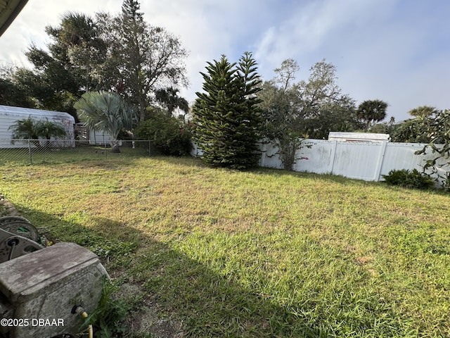 view of yard featuring fence