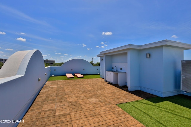 view of patio / terrace featuring sink