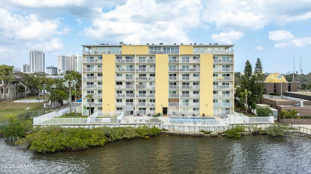 view of building exterior featuring a water view