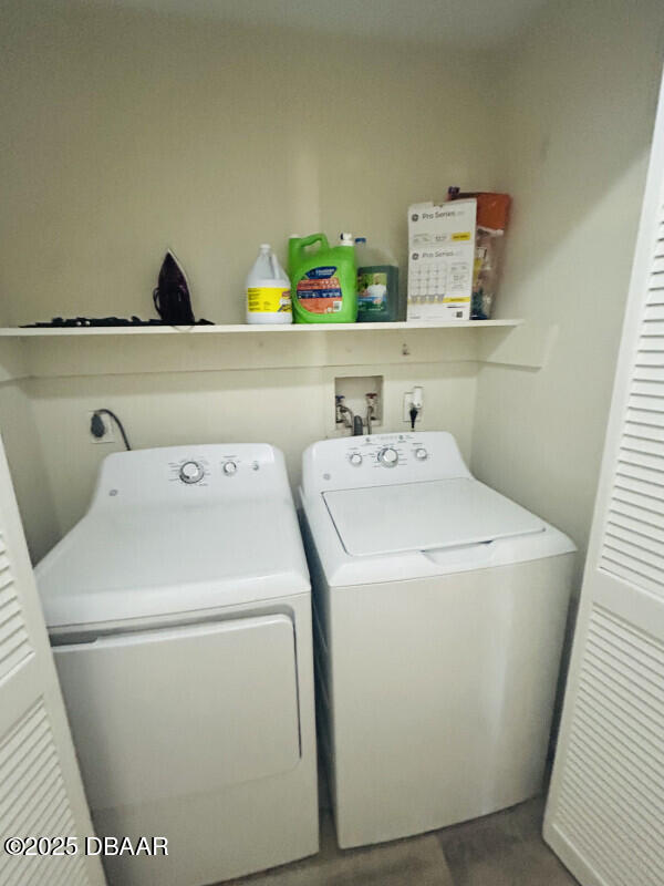 laundry room featuring independent washer and dryer