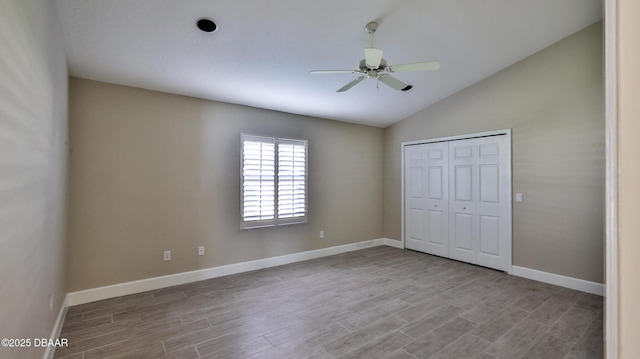 51 Bay Pointe Dr, Ormond Beach, FL 32174 - unfurnished bedroom featuring ceiling fan, a closet, lofted ceiling, and light hardwood / wood-style flooring