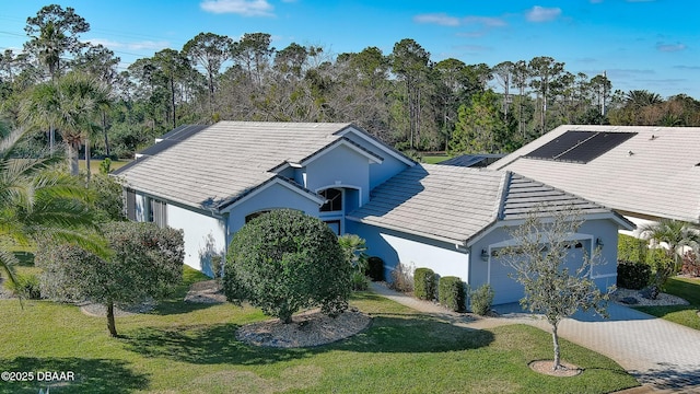 51 Bay Pointe Dr, Ormond Beach, FL 32174 - single story home featuring a garage and a front lawn