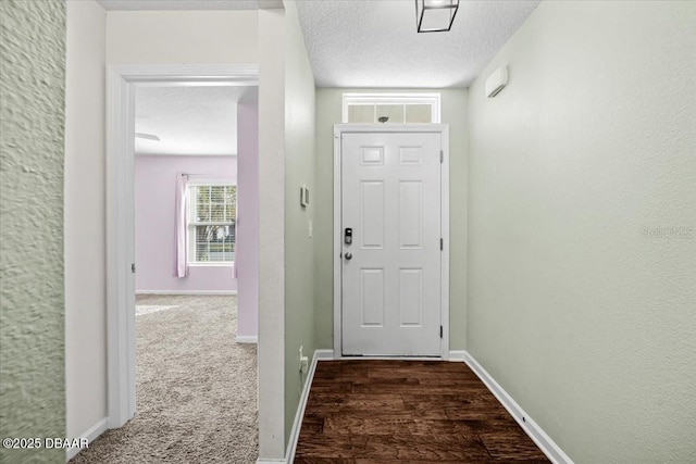 20 Sand Wedge Ln, Bunnell, FL 32110 - doorway with a textured ceiling, baseboards, and dark wood-type flooring