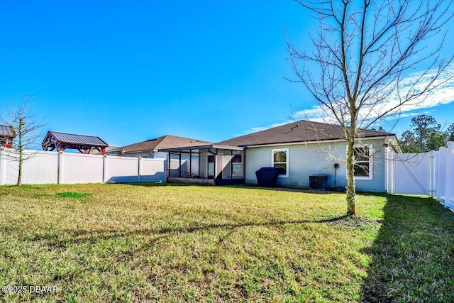 20 Sand Wedge Ln, Bunnell, FL 32110 - back of house featuring cooling unit, stucco siding, and a sunroom