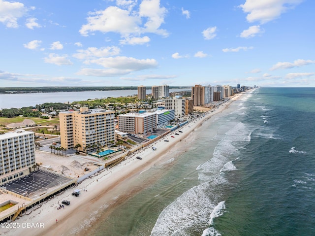 view of urban area with expansive beach