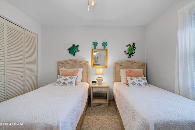 bedroom featuring a closet and carpet floors