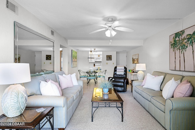 living room featuring ceiling fan