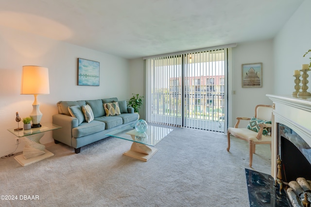 carpeted living room featuring a fireplace