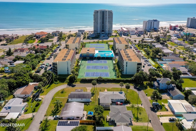 aerial view with a beach view and a water view