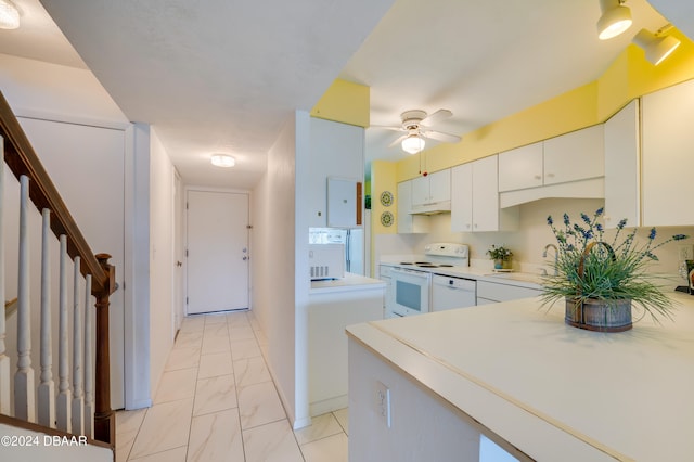 kitchen featuring white cabinetry, sink, white appliances, and ceiling fan