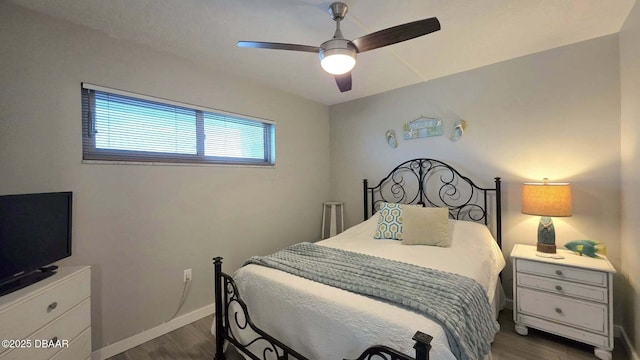 1133 Ocean Shore Blvd Unit 506, Ormond Beach, FL 32176 - bedroom featuring dark wood-style flooring and ceiling fan