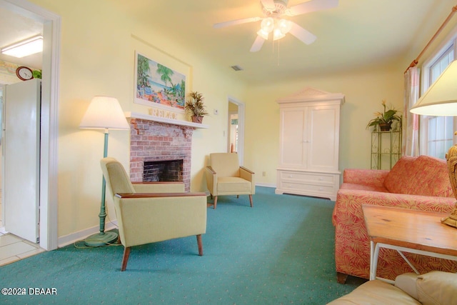 living room with carpet flooring, ceiling fan, and a brick fireplace