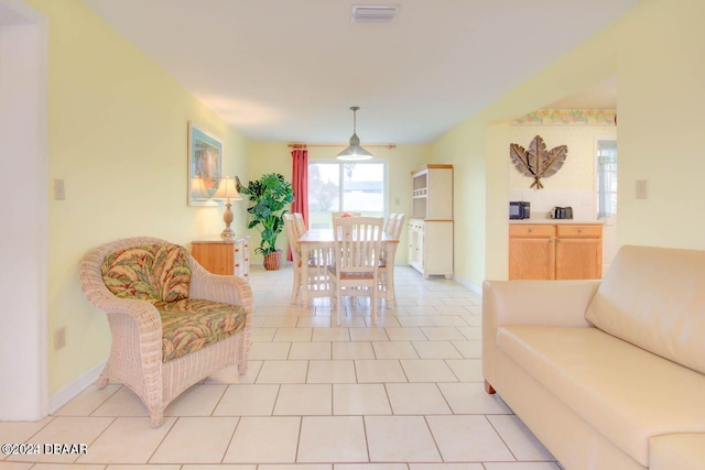 living room featuring light tile patterned floors