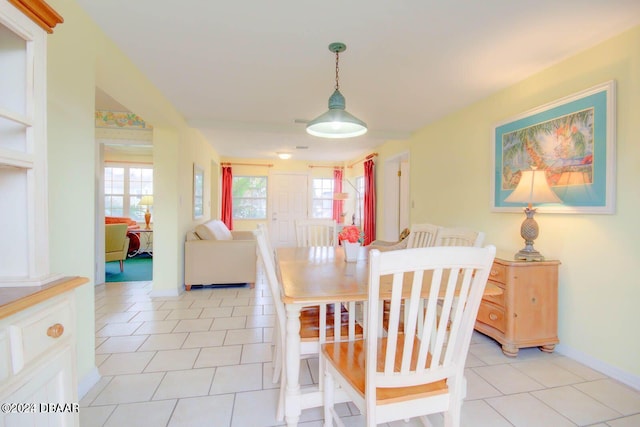 view of tiled dining space