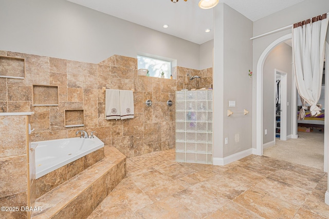 bathroom featuring plus walk in shower