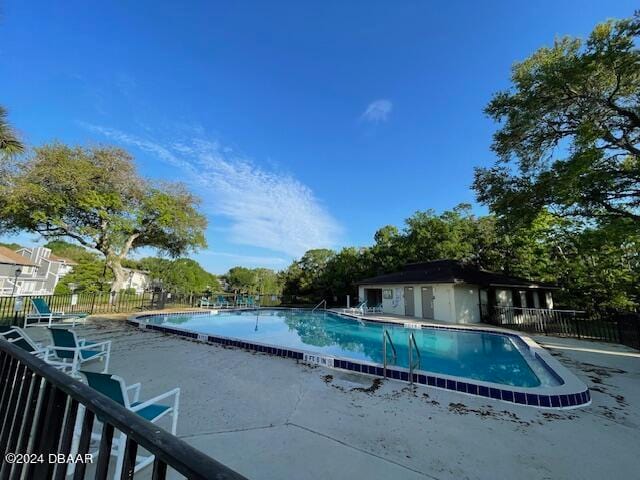 view of pool featuring a patio area