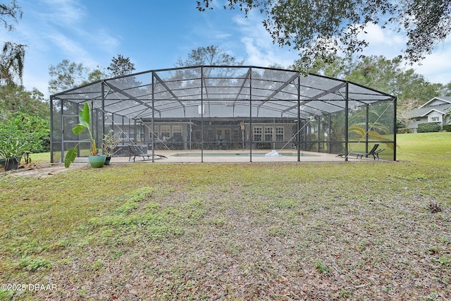 exterior space with a lanai and a swimming pool