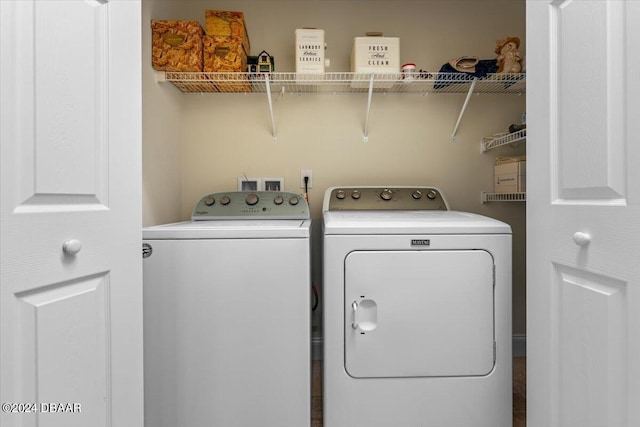 laundry room featuring washer and clothes dryer