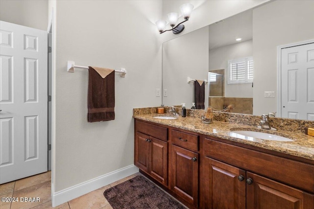 bathroom with vanity and tile patterned flooring