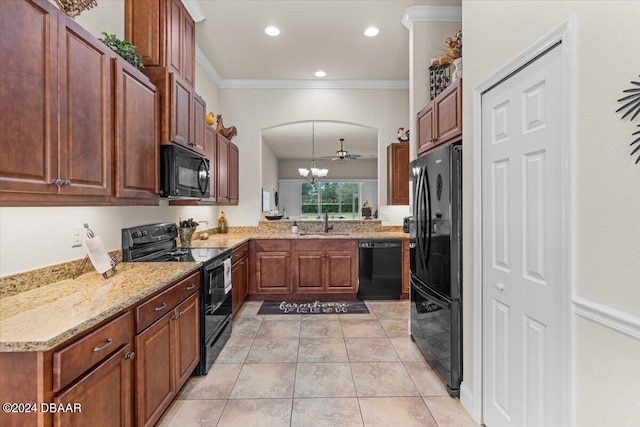 kitchen with light stone counters, black appliances, sink, light tile patterned floors, and crown molding