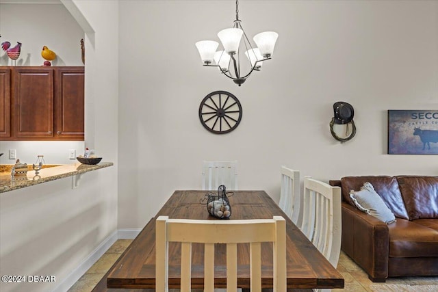 dining room with a chandelier