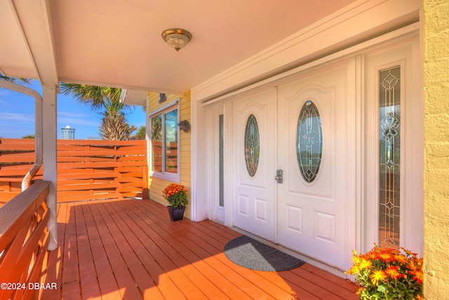 doorway to property with covered porch