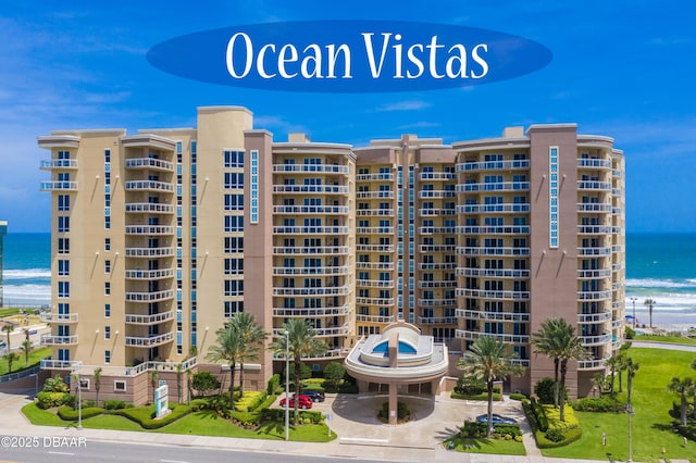 view of building exterior with a water view