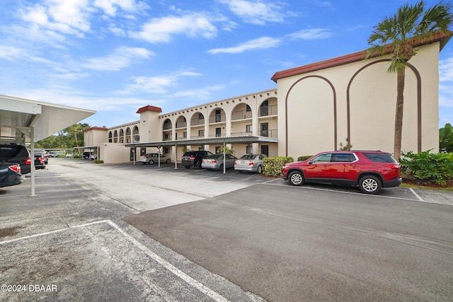 view of car parking featuring a carport