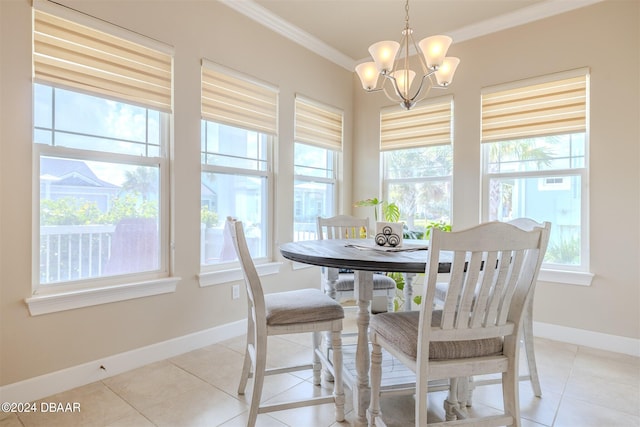 dining room with a chandelier, plenty of natural light, light tile patterned flooring, and crown molding