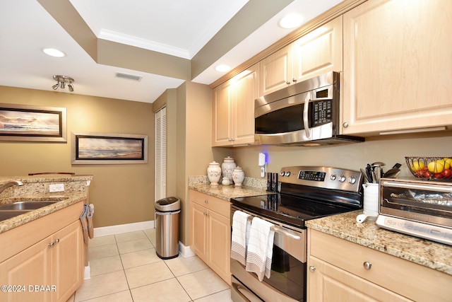 kitchen with crown molding, appliances with stainless steel finishes, light tile patterned floors, light brown cabinets, and sink