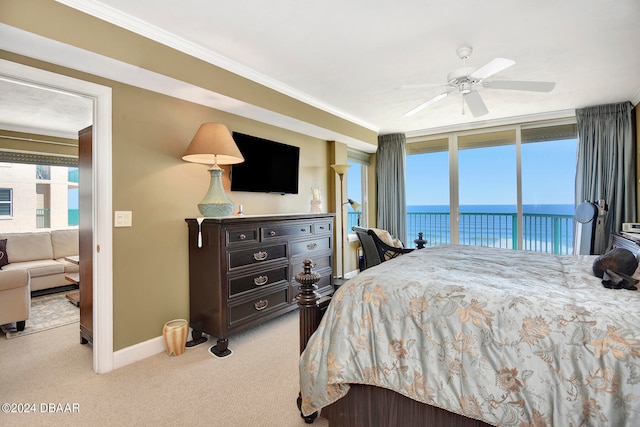 bedroom featuring access to outside, multiple windows, light colored carpet, and ceiling fan