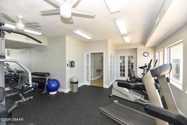 gym featuring french doors