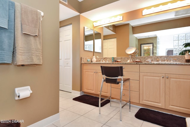 bathroom featuring vanity and tile patterned flooring