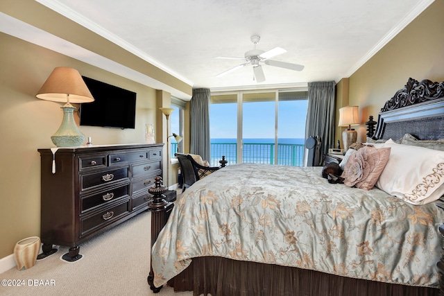 carpeted bedroom with ceiling fan, access to exterior, and crown molding