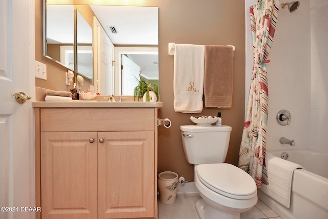 full bathroom featuring vanity, tile patterned floors, toilet, and shower / tub combo with curtain