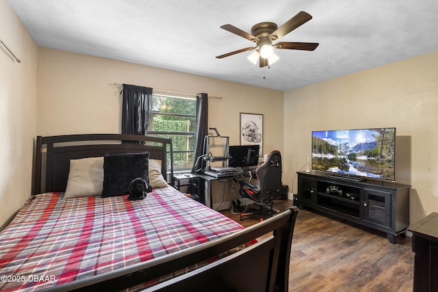 552 Hamlet Dr, Port Orange, FL 32127 - bedroom with wood finished floors and ceiling fan